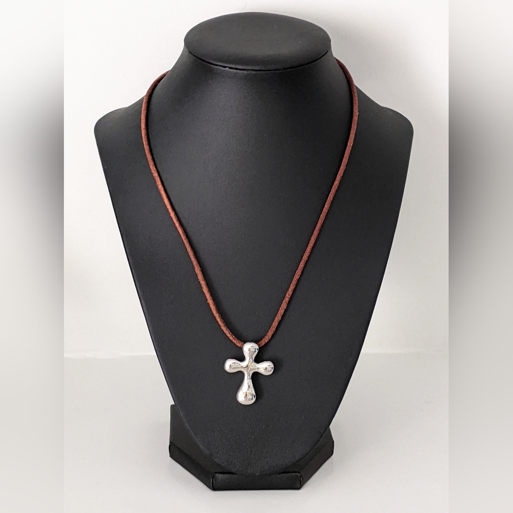 JCM STAINLESS STEEL CROSS ON LEATHER CORD